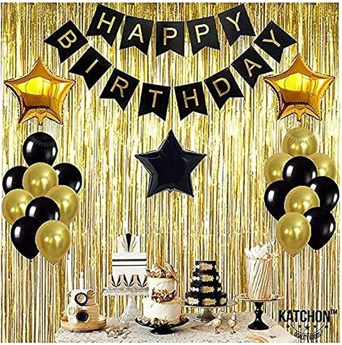 Full Wall Decoration Including Gold Metallic Foil Fringe (300cm height x 100cm width) 3 Star Balloons (2 gold and 1 black) 18 Latex Balloons (9 gold and 9 black)